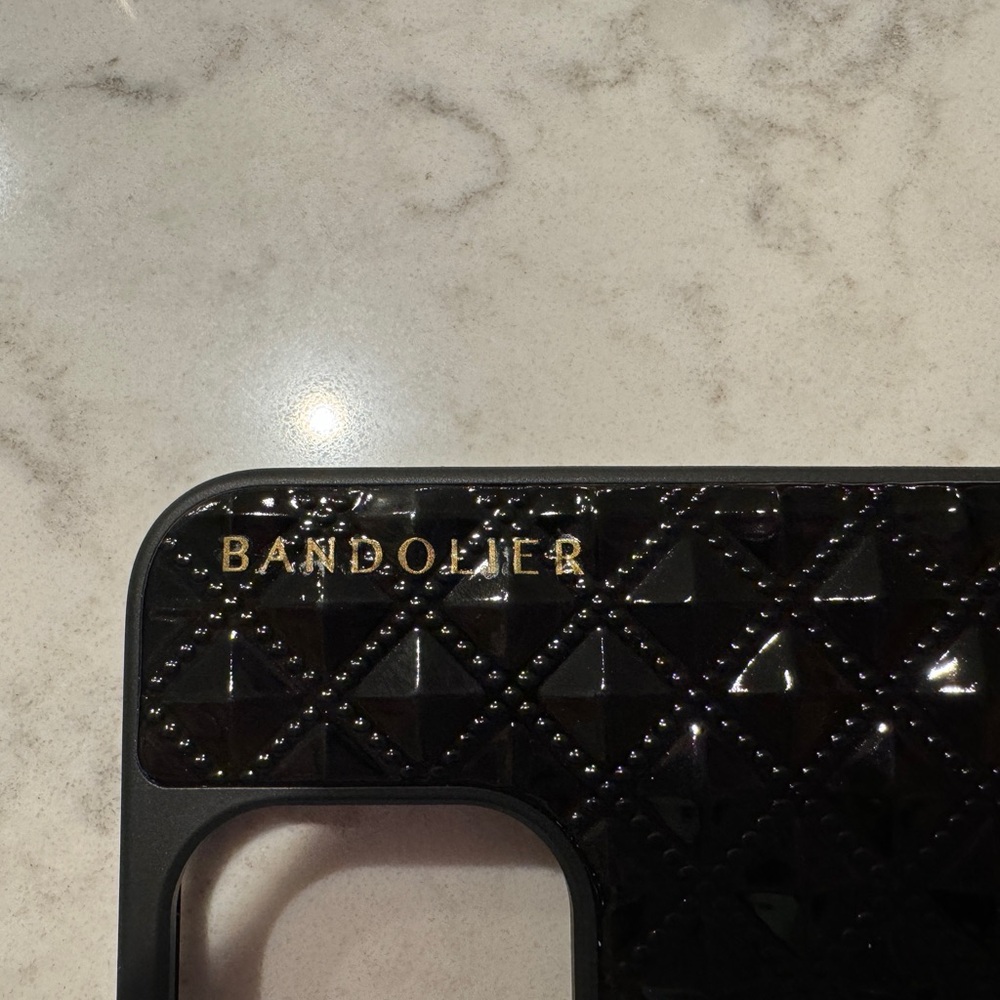 Bandolier phone holder on a chain. Never used.